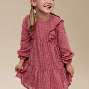 Coperta in pelliccia con pon pon